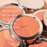 A close-up of Ere Perez Rice Powder Blush - Bondi Refill 9g compacts with a pink-orange shade and silver edges, showcasing the vegan, refillable design—free from plastic, hinges, paints, mirrors, glue, or stickers.