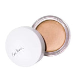 A small round container of Ere Perez Vanilla Highlighter Balm with a white lid partially open, revealing creamy beige highlighter. "Ere Perez" appears in gray script on the lid, hinting at its natural brightening effect.