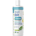 A white 16 fl oz (473 mL) bottle of Essential Oxygen Toothpaste & Mouthwash Brushing Rinse, labeled dentist recommended for whiter teeth and fresher breath, is organic, peppermint-flavored, fluoride-free, and features plant illustrations.