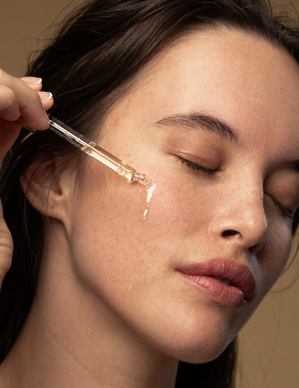 Model applying Antipodes Eve Bio-Retinol Line Reduction Serum
