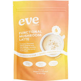 A yellow-orange pouch labeled Eve Wellness Functional Mushroom Latte - Salted Caramel 124.8g, featuring energy support, no added sugar, dairy-free formula, with Lion’s Mane mushrooms and collagen illustrated on the pack.