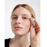 Using Dr Hauschka Eye Make-up Remover with a cotton pad
