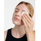 Model removing eye make-up with Dr Hauschka Eye Make-up Remover
