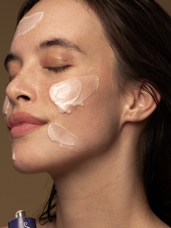 Model wearing Antipodes Flora Probiotic Skin-Rescue Hyaluronic Mask