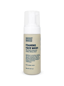 Noosa Basics Foaming Face Wash – Acne Prone Skin 150ml features Neroli Hydrosol, Black Willow Bark, and tea tree. The beige label lists ingredients and usage details, with a white foaming pump dispenser on top.