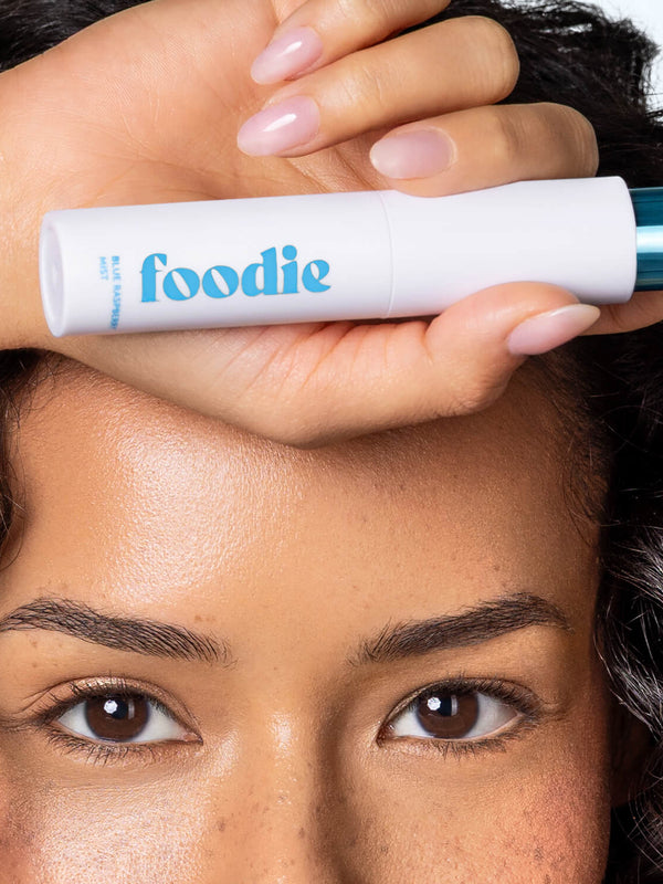 Model using Foodie Blue Raspberry Face and Body Mist