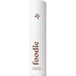 A white cylindrical bottle labeled "Foodie" holds the Chocolate Crunch Face & Body Mist (10ml), shown upright against a white background—ideal as a chocolate-scented mist for teen skincare fans.