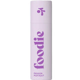 Foodie Passion Pop Pout Lip Balm 10g comes in a light purple cylindrical bottle with "foodie" in bold purple and "PASSION POP POUT" on the label, all packaged in natural, plastic-free packaging.