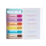 An open box holds the Foodie Sweet Spritz Mist Kit (6 x 10ml), featuring six colorful Face & Body Mists with assorted caps, plus a printed guide showing their fruity scents and names.