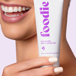Model using Foodie Passion Pop Body Moisturiser