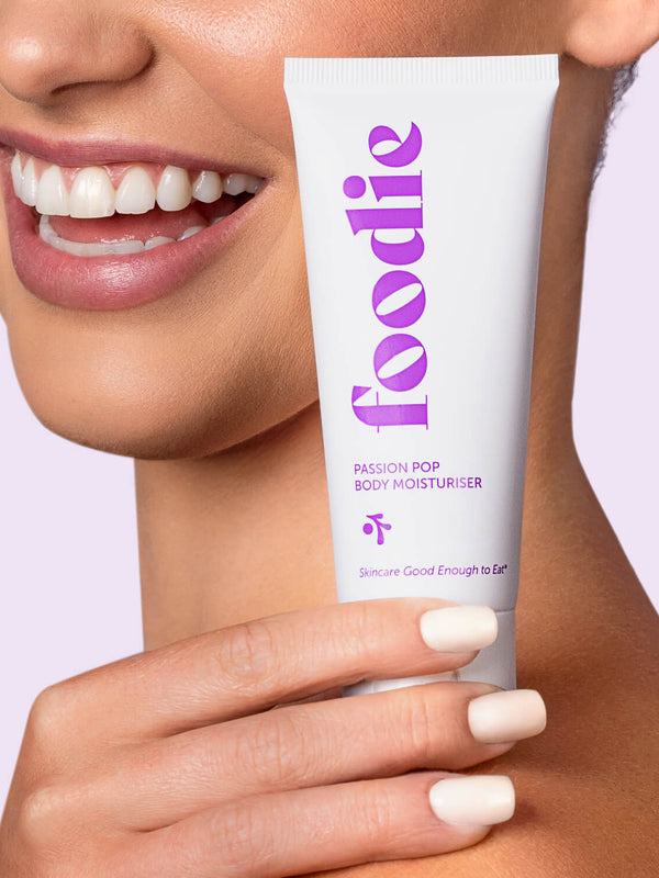 Model using Foodie Passion Pop Body Moisturiser