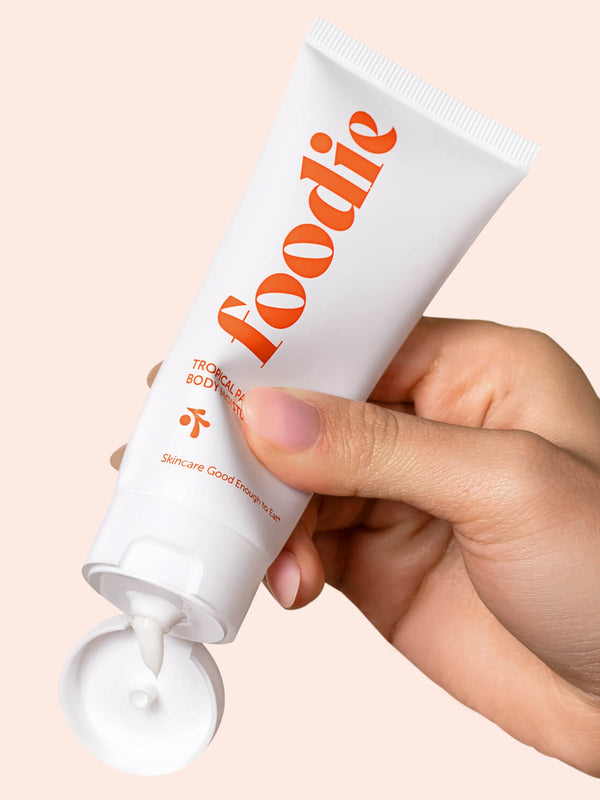 Model using Foodie Tropical Pavlova Body Moisturiser