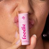 Model wearing Foodie Strawberry Sundae Smooch Lip Balm
