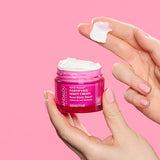 Andalou 1000 Roses Fortifying Night Cream jar held in hand