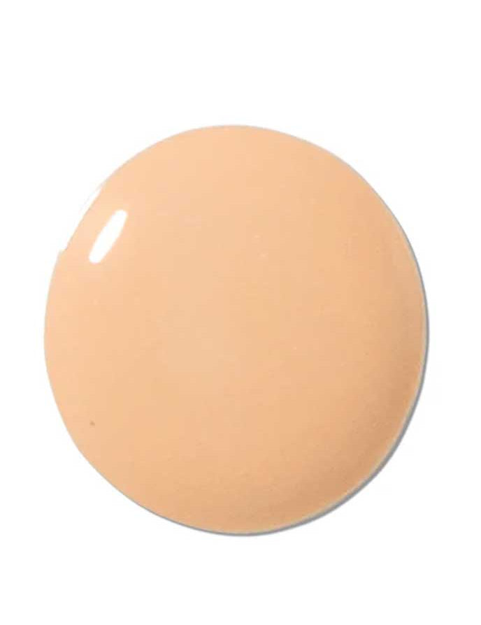 A round, smooth swatch of 100% Pure 2nd Skin Foundation 35ml in light beige provides natural-looking coverage, displayed on a white background.