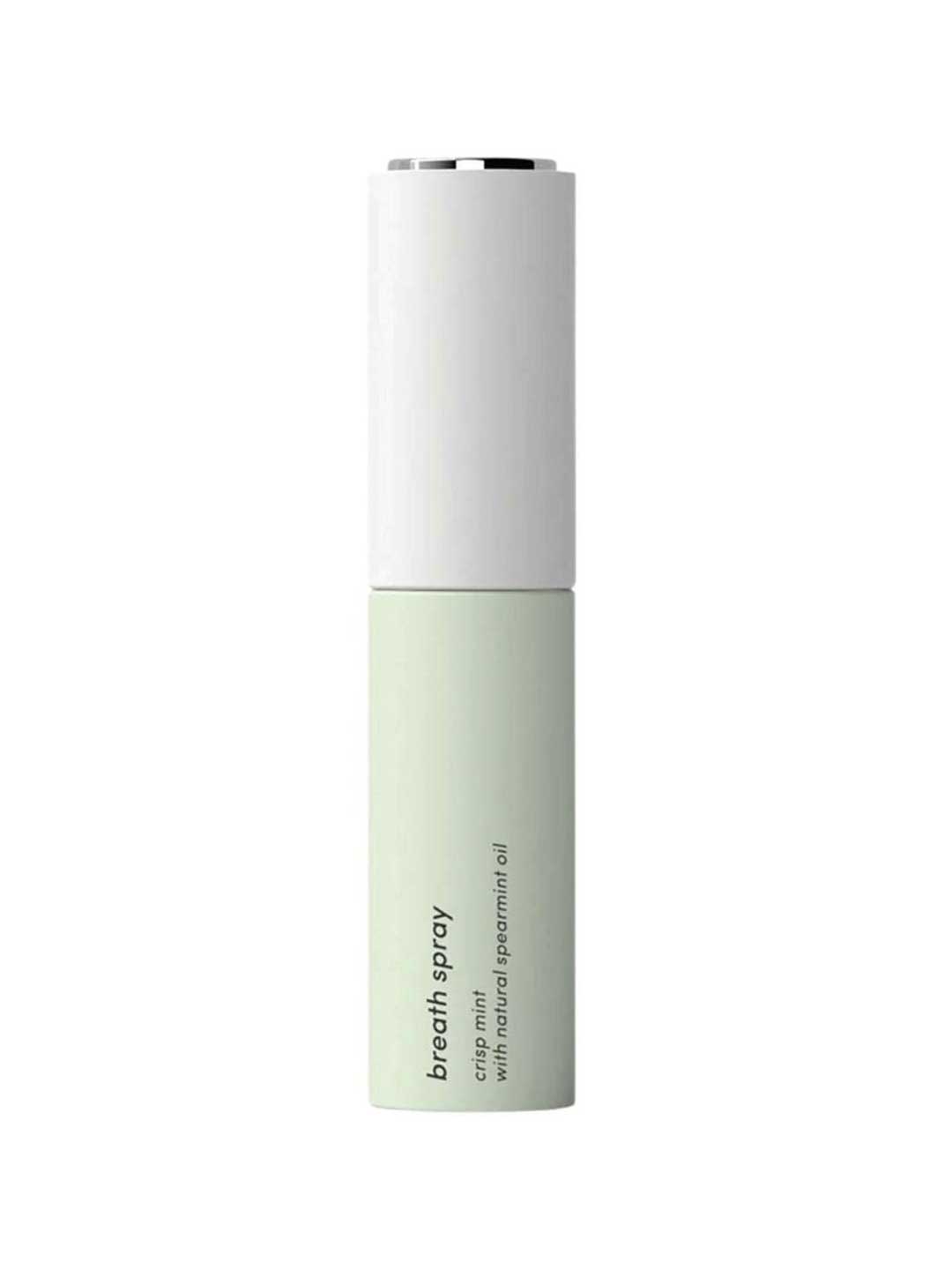 A tall, slim cylindrical bottle of breath spray with a white upper section and a pale mint green lower section, featuring black text that reads 'breath spray' and 'with natural spearmint oil'.
