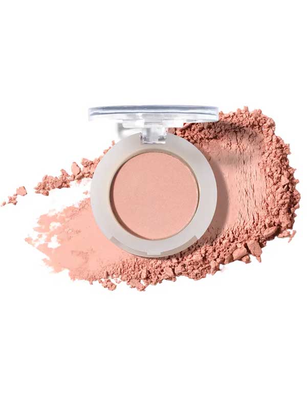 An open 100% Pure Fruit Pigmented® Eye Shadow 2g by 100% Pure, in light pink pressed powder, displays scattered pigment artfully arranged beside it on a white background.