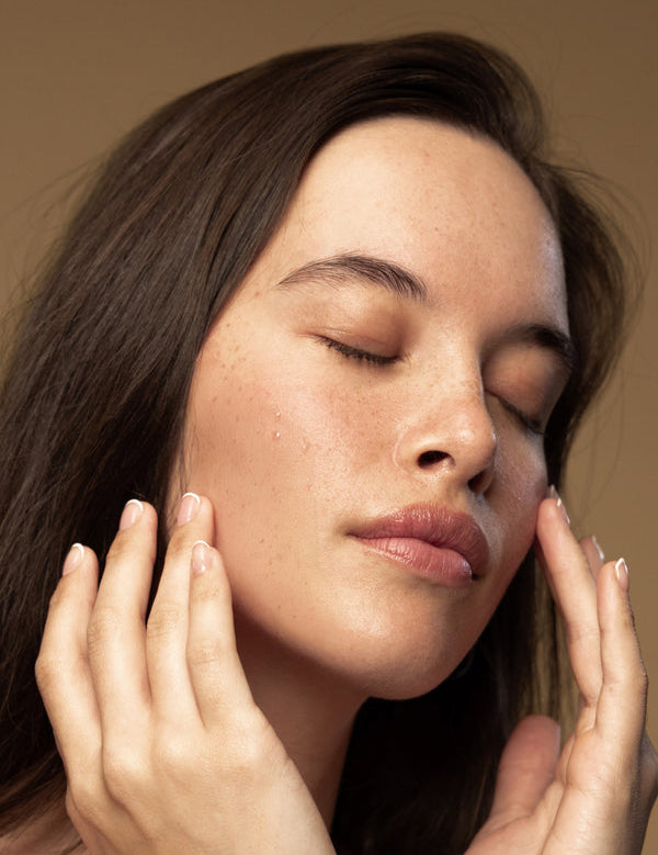 Model using Antipodes Glory Vitamin C Triple-Action Glow Toner