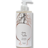 100% Pure Glossy Locks Glossing Shampoo in a clear bottle of pale liquid, with a white pump and a light label showing line drawings of pomegranates and leaves.