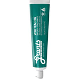 Green tube of Grants whitening natural toothpaste on a white background
