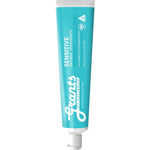 Blue tube of Grant's Sensitive toothpaste on a white background