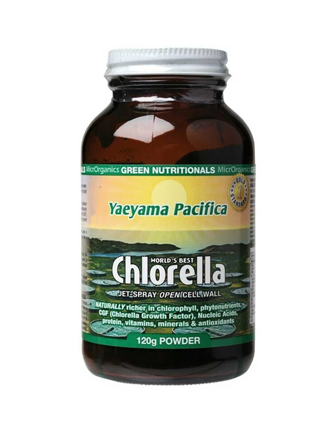 A 120g brown glass bottle of Green Nutritionals Yaeyama Pacifica Chlorella Powder features green and white text highlighting its chlorophyll-rich superfood benefits, with a scenic water background on the label.