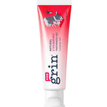 Tube of Grin Kids toothpaste on a white background