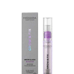 A tube of Madara Grow Fix Lash And Brow Booster Clear 4.25ml with purple liquid and a clear cap is shown next to its grey box, both featuring product and brand text.
