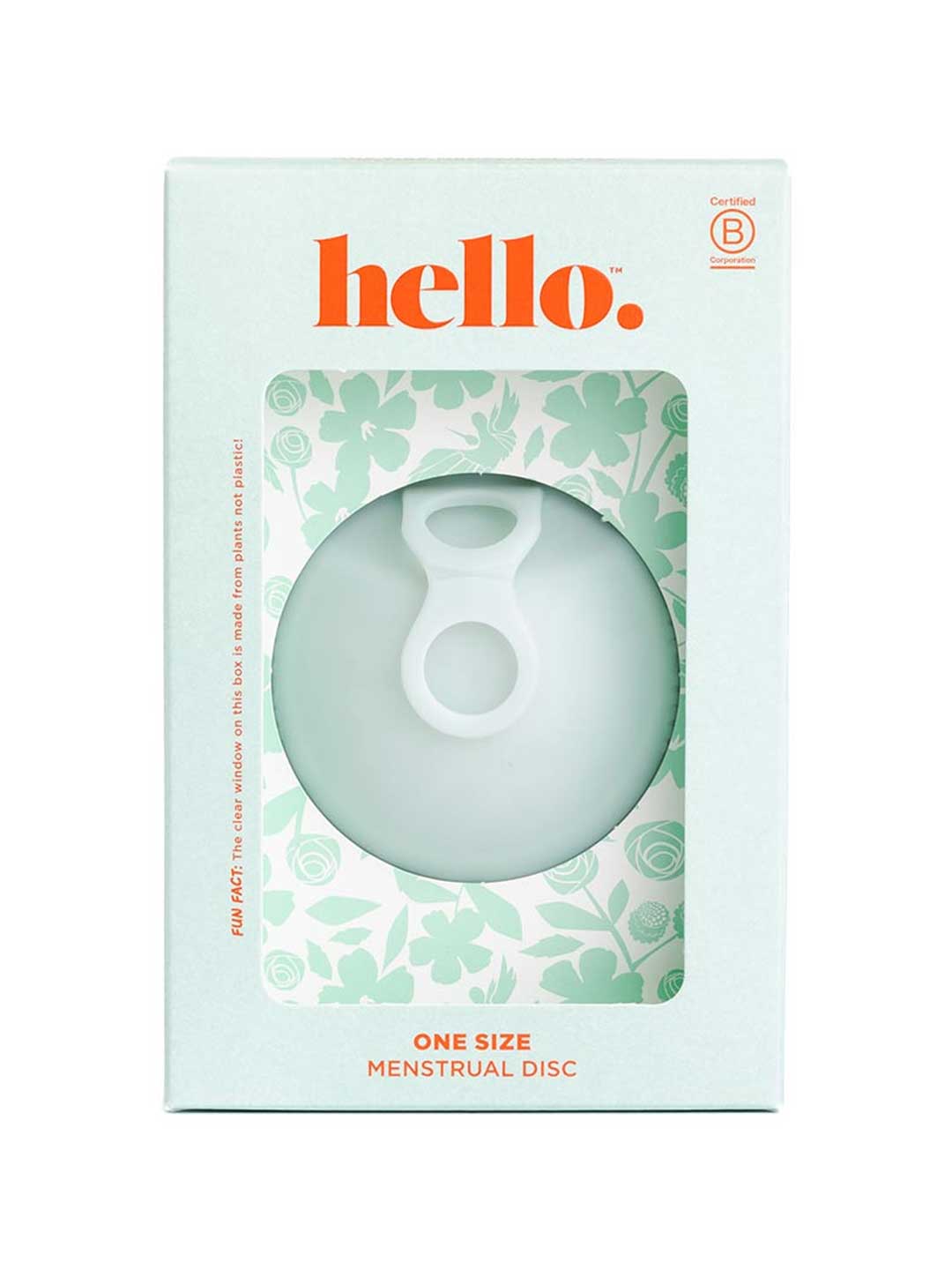 A light green box labeled “Hello Menstrual Disc - Sea Fog” features “hello.” in orange, a floral pattern, and a clear window showing a circular, medical-grade silicone menstrual disc with an inner loop. Box reads One Size Menstrual Disc.