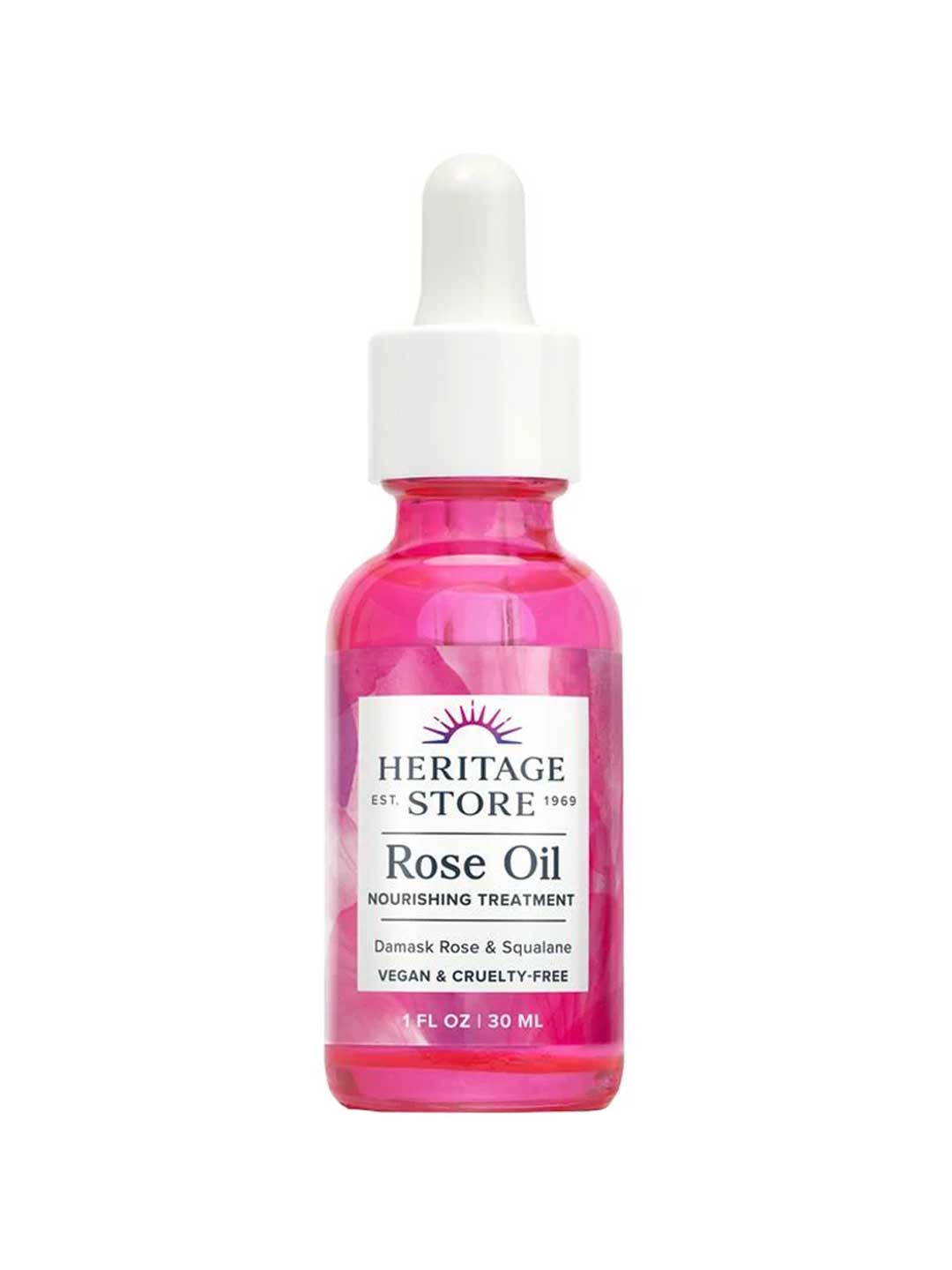 The Heritage Store Rose Oil 30ml comes in a pink dropper bottle, ideal for dispensing this nourishing facial oil infused with rose oil.