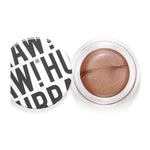 An open Hurraw! Bronze Aura Balm 5.8g reveals its swirled bronze shimmer balm. The white lid sits beside it, bold black "RAW! HURRAH!" text showing. This vegan, multi-use makeup doubles as a radiant glow highlighter.