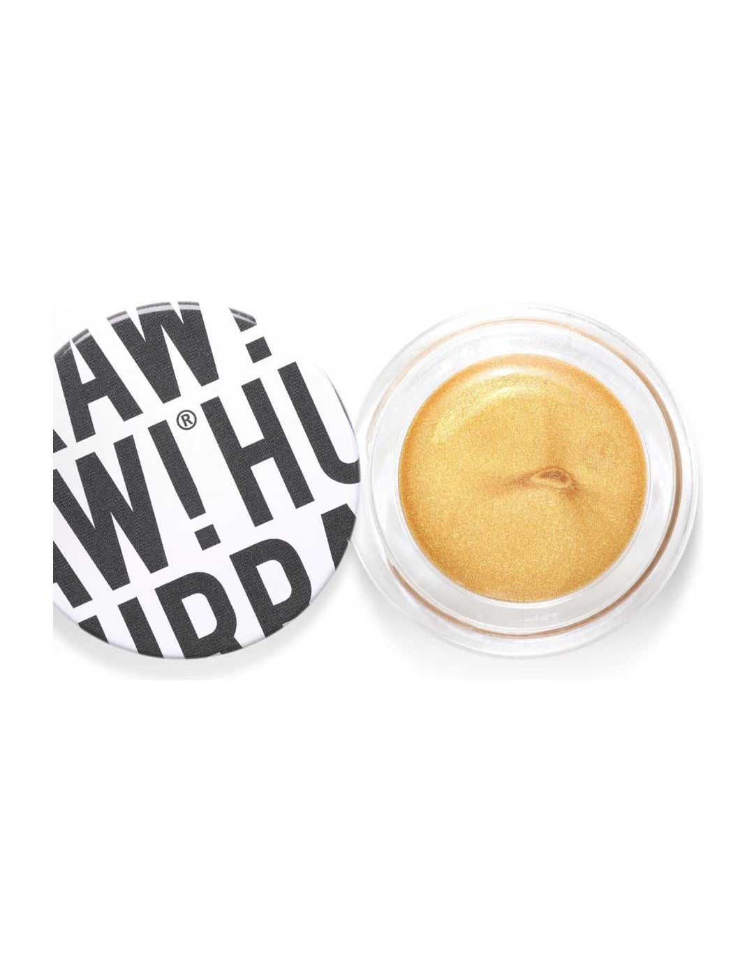 An open round container of Hurraw! Gold Aura Balm 5.8g, a vegan gold cream highlighter with a shimmery finish. The white lid, displaying bold black text "RAW! HU", sits slightly askew beside the product.