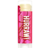 A 4.8g tube of Hurraw! Kapha Lip Balm Grapefruit Ginger & Eucalyptus, with a pink and red label, bold white and yellow text, and a clear cap showing the light yellow organic balm inside.