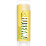 A yellow tube of Hurraw! Organic Lip Balm - Banana with Baobab 4.8g features a banana image and text on the label, plus a clear cap over slightly raised balm.