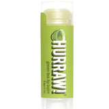 A 4.8g Hurraw! Organic Lip Balm in Green Tea stands upright with a translucent cap and lime graphics, set against a white background.