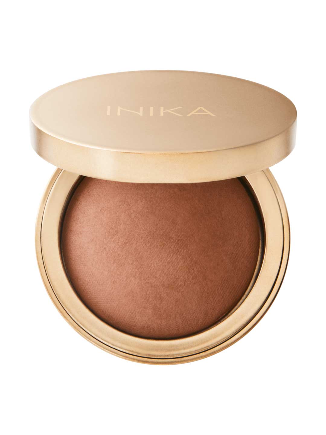 The INIKA Organic Baked Mineral Bronzer - Sunbeam 9g features a gold compact with a dome-shaped bronzer inside, ideal for a radiant sun-kissed look. The lid displays "INIKA" in gold lettering.