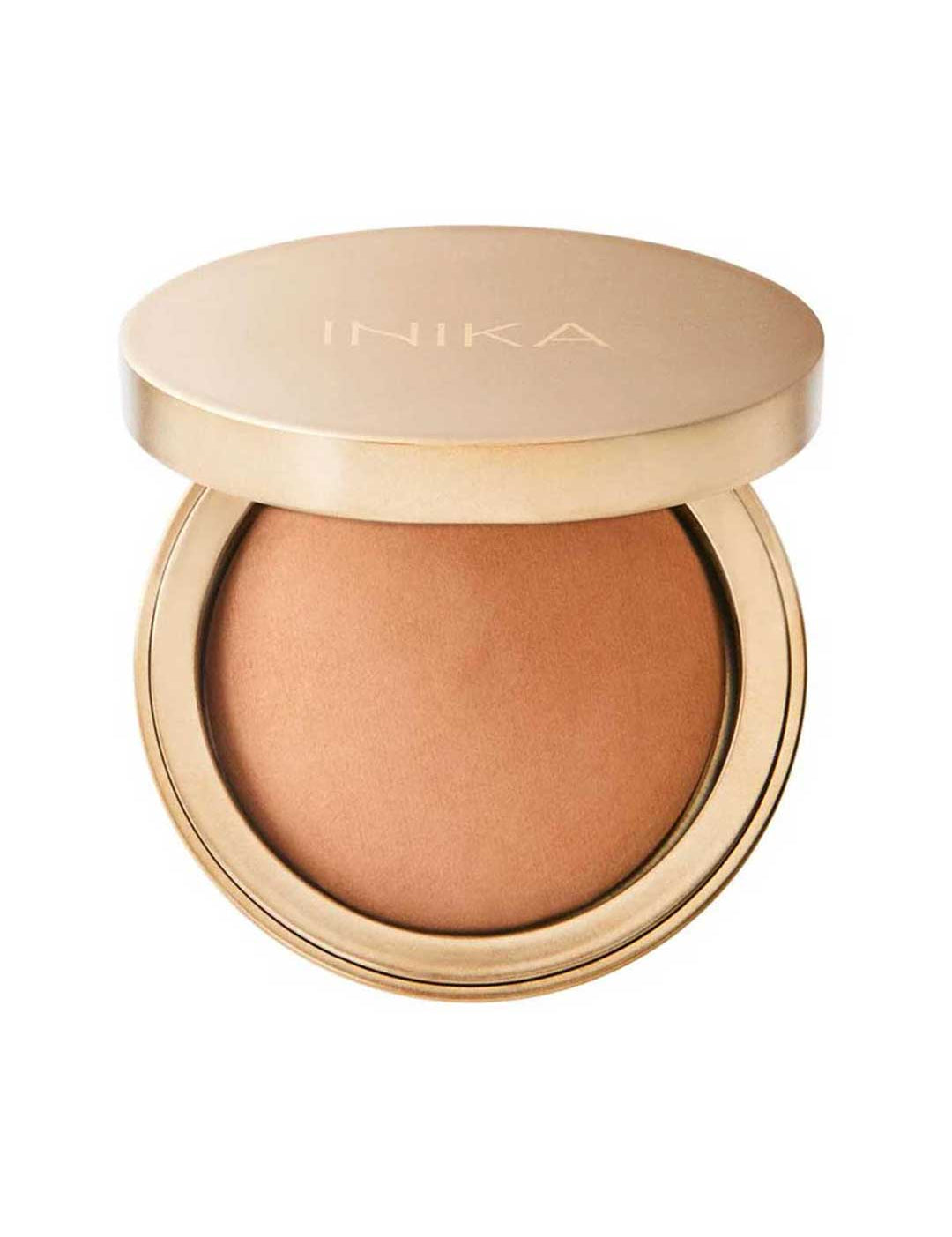 A gold compact of INIKA Organic Baked Mineral Bronzer - Sunkissed 9g with the lid partially open, revealing the warm brown vegan bronzer inside for a natural, sun-kissed glow.