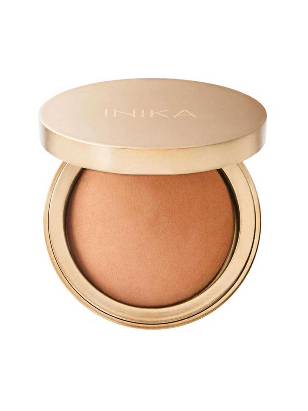 A gold compact of INIKA Organic Baked Mineral Bronzer - Sunkissed 9g with the lid partially open, revealing the warm brown vegan bronzer inside for a natural, sun-kissed glow.