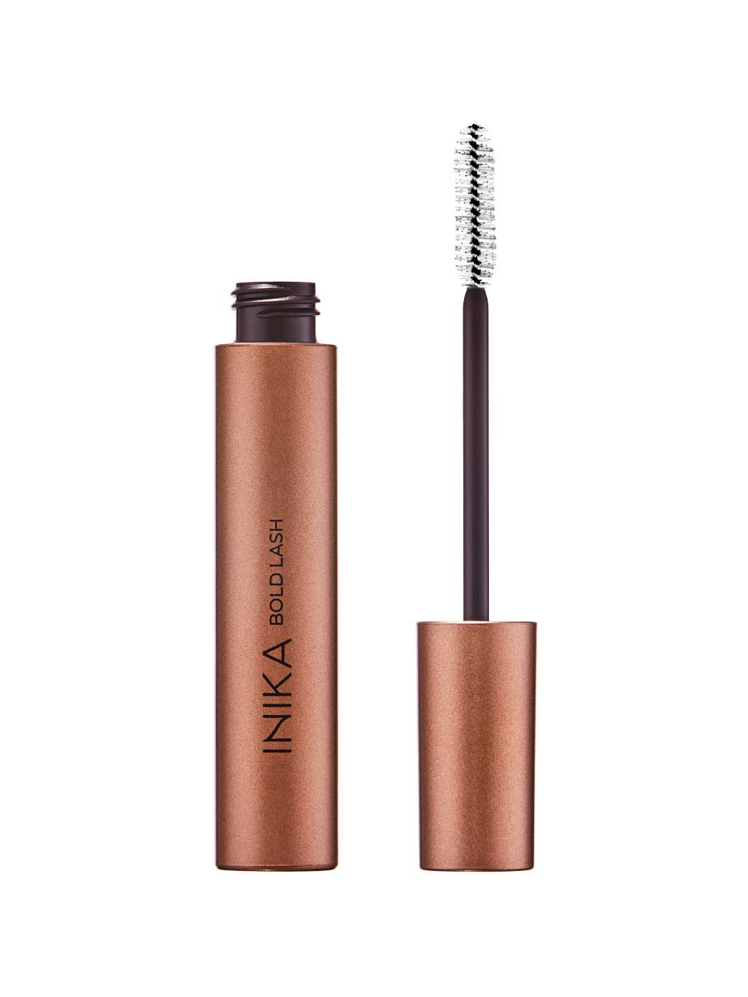A metallic bronze tube of INIKA Organic Bold Lash Mascara Black 13ml with the cap off and the white bristle wand standing upright beside it, highlighting this volumising mascara’s elegant packaging.
