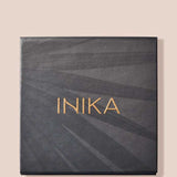 A square, dark gray box with INIKA in gold letters centered on the lid, set against a light beige background—perfect for keeping your INIKA Organic Brow Palette 8g.