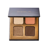The INIKA Organic Eyeshadow Quad - Sunset 8g offers four talc-free mineral shades—light gold, peach, bronze, and dark brown—in a chic gold-trimmed case with a black lid labeled INIKA.