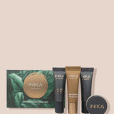INIKA Organic Foundation Trial Sets - 4 Piece Set includes four sample tubes and a small round vegan foundation container in earth-toned packaging, displayed on a light beige background.