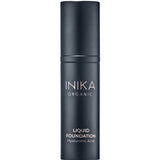 INIKA Organic Liquid Foundation 30ml comes in a sleek black bottle with white text, offering a luxurious formula enriched with hyaluronic acid for a dewy finish.