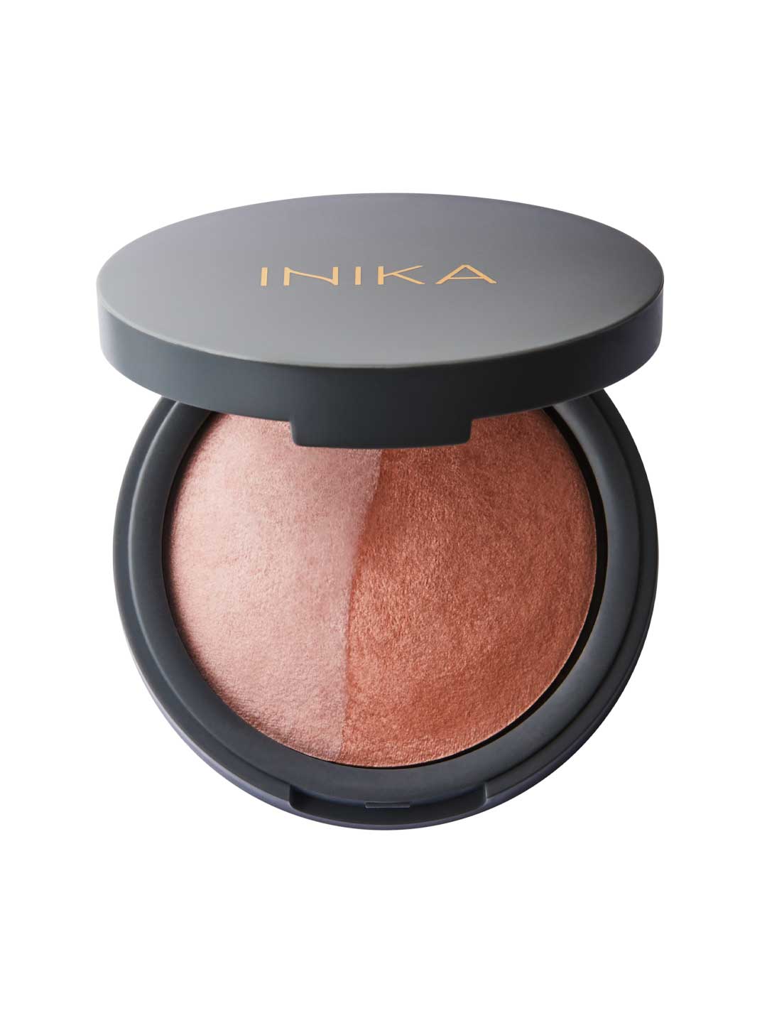 An open round compact reveals the INIKA Organic Mineral Baked Blush Duo - Pink Tickle 6.5g, featuring domed vegan blush in peach and rose shades from the Mineral Baked Blush collection.