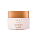 A 50ml jar of INIKA Organic Phytofuse Renew Day Cream, a nourishing face cream for mature skin, is shown in a white container with a gold lid against a plain white background—ideal for daily hydration.