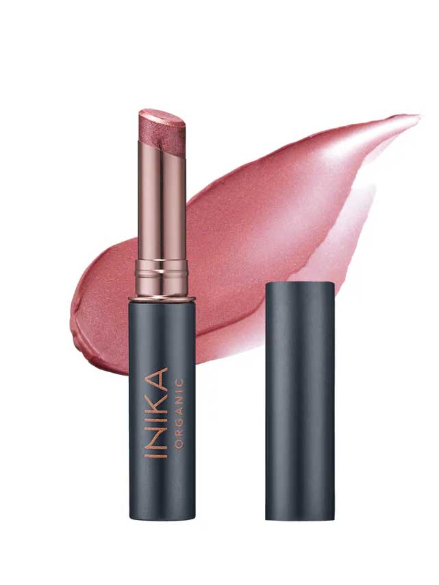 The INIKA Organic Tinted Lip Balm - Mulberry 3.5g features a rose-pink hue and comes in a sleek metallic black and gold case, ideal to use alone or paired with your favorite vegan lip balm for extra moisture.