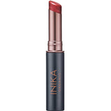 A tube of INIKA Organic Tinted Lip Balm - Mulberry 3.5g in metallic rose gold and dark grey casing, with the vegan pinkish-red balm partially twisted up.