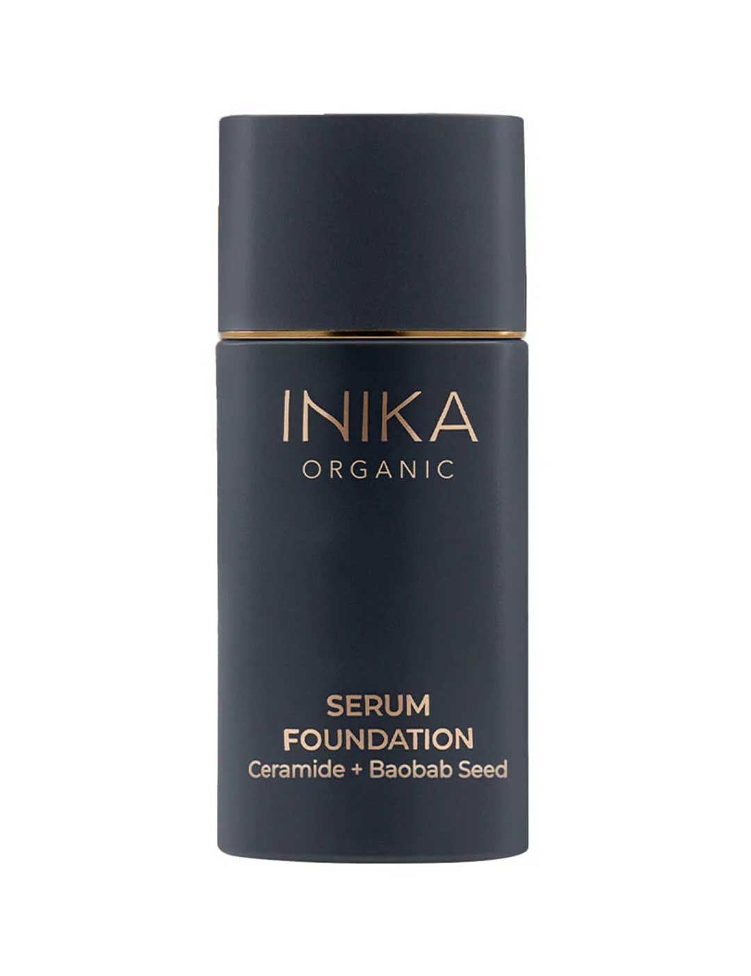 A sleek black bottle of INIKA Organic Serum Foundation 25ml with gold text features ceramide and baobab seed. This vegan, hydrating foundation has a simple, modern design.