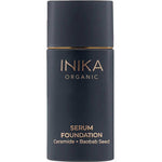 A sleek black bottle of INIKA Organic Serum Foundation 25ml with gold text features ceramide and baobab seed. This vegan, hydrating foundation has a simple, modern design.