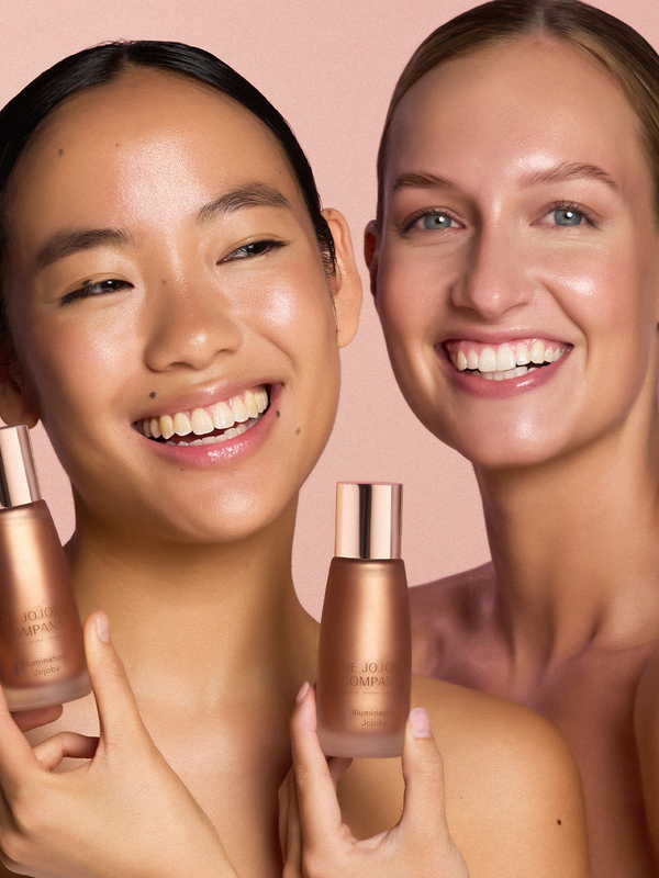 Model with The Jojoba Company Illuminating Jojoba